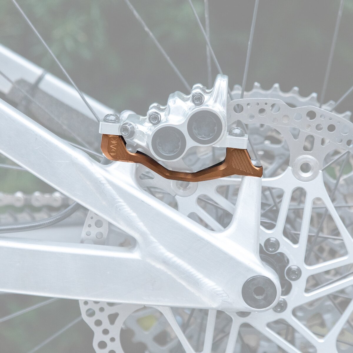 OAK Components OAK Components Plasmadapt Brake Adapter Kash Gold, PM +20mm - $45.00 at Competitive Cyclist